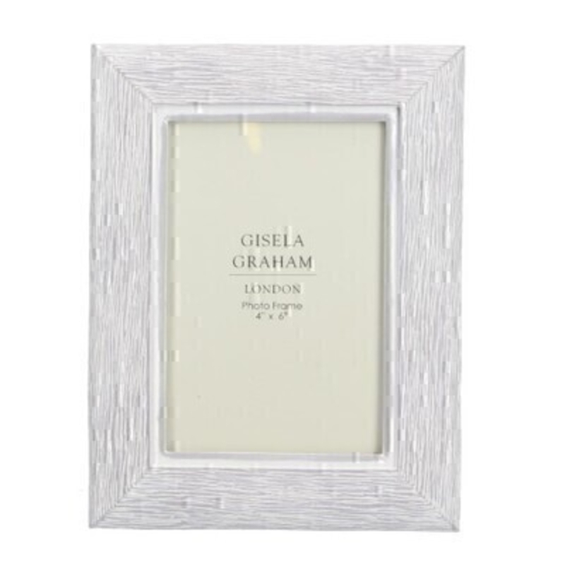 This grey resin picture frame fits a 4x6inch photo. Made by London based designer Gisela Graham who designs really beautiful gifts for your home and garden.  This photo frame would suit any home decor and would make a lovely gift. Matching smaller photo frame also available.